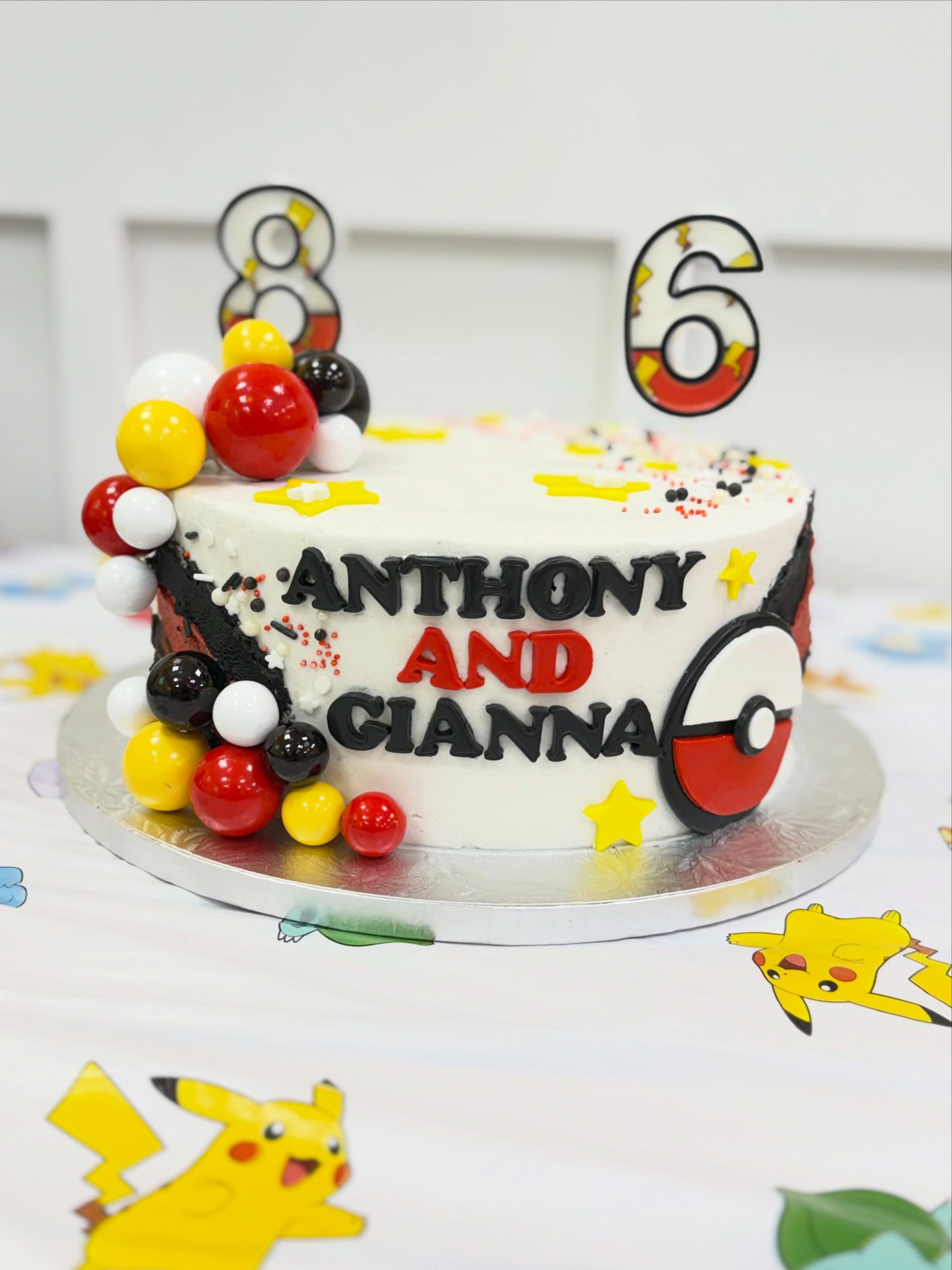 Prepare for trouble, make it double! Happy birthday Anthony &amp; Gianna! What a fun set to make! 

Cake Details:
3 vanilla cake layers
Strawberry icing filling
Vanilla outside
Fondant letters, stars and handmade fondant Pokeball

Cupcake Details:
24
