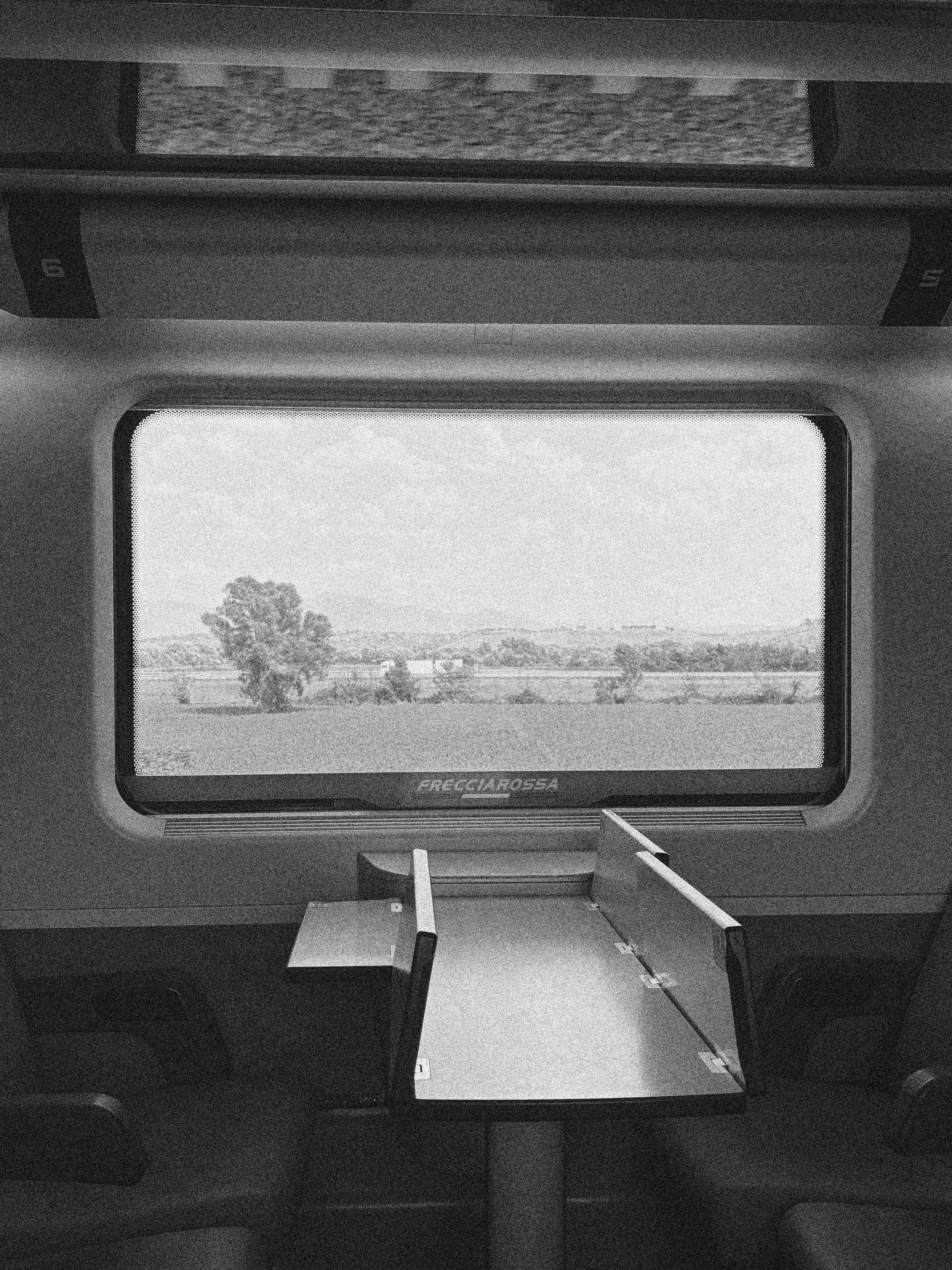 SOMEWHERE ON A TRAIN BETWEEN NAPLES AND GENOA, ITALY