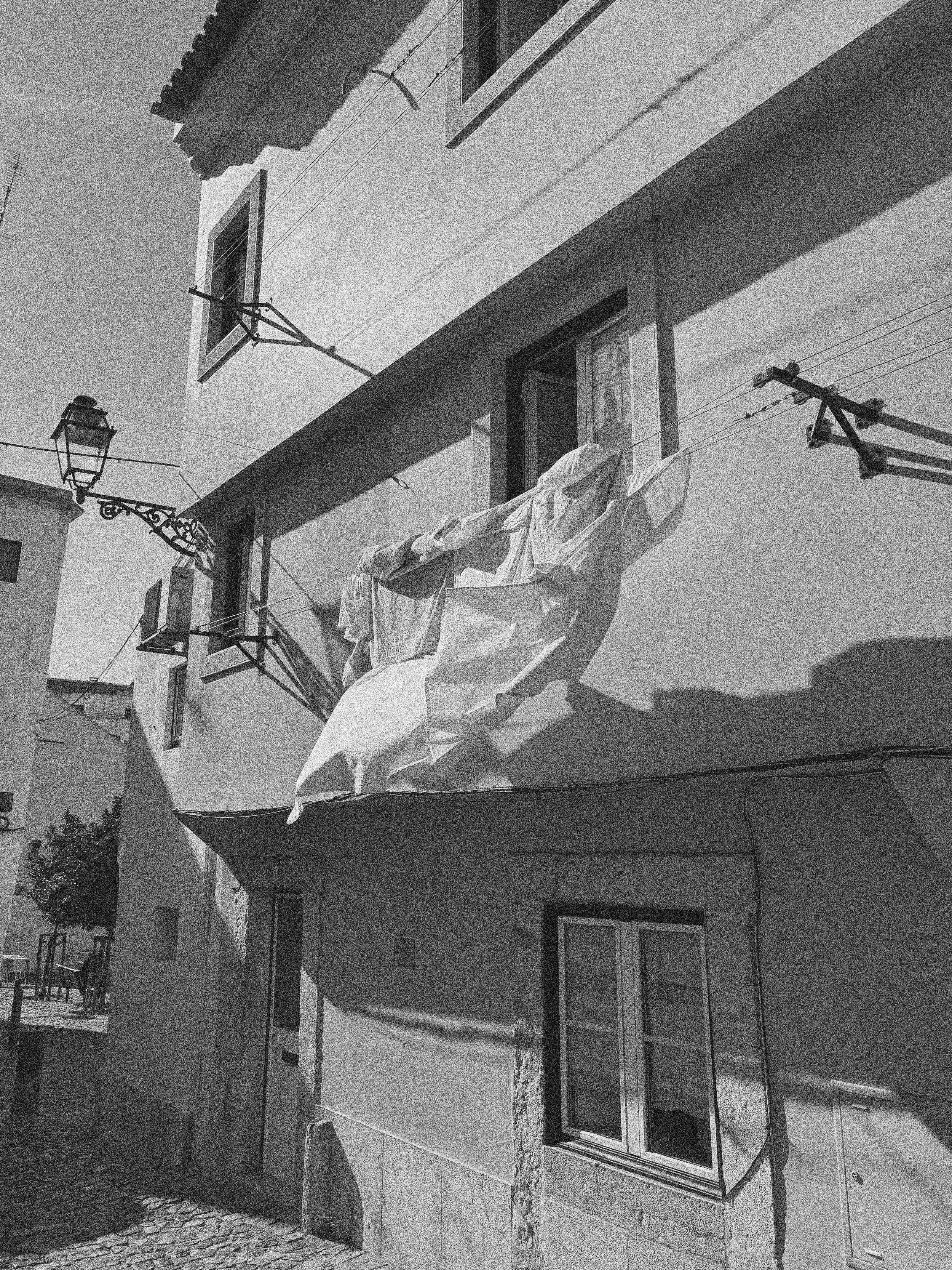 HANGING LAUNFRY IN LISBON, PORTUGAL