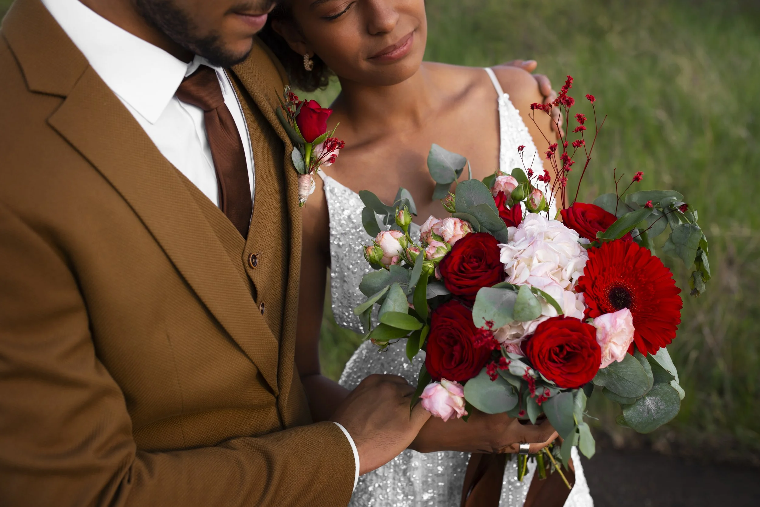 high-angle-bride-groom-posing-with-flowers.jpg