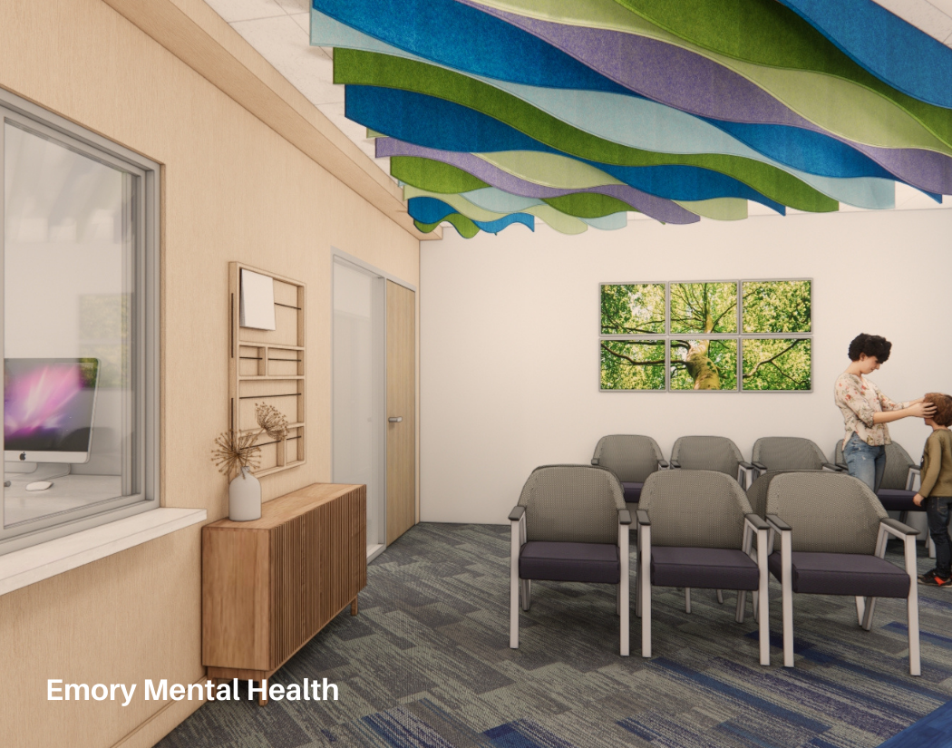 A room at Emory Mental Health with beige walls, gray chairs arranged in rows, a window with a view of trees, colorful wave-shaped ceiling panels, and two people with a child in the background.