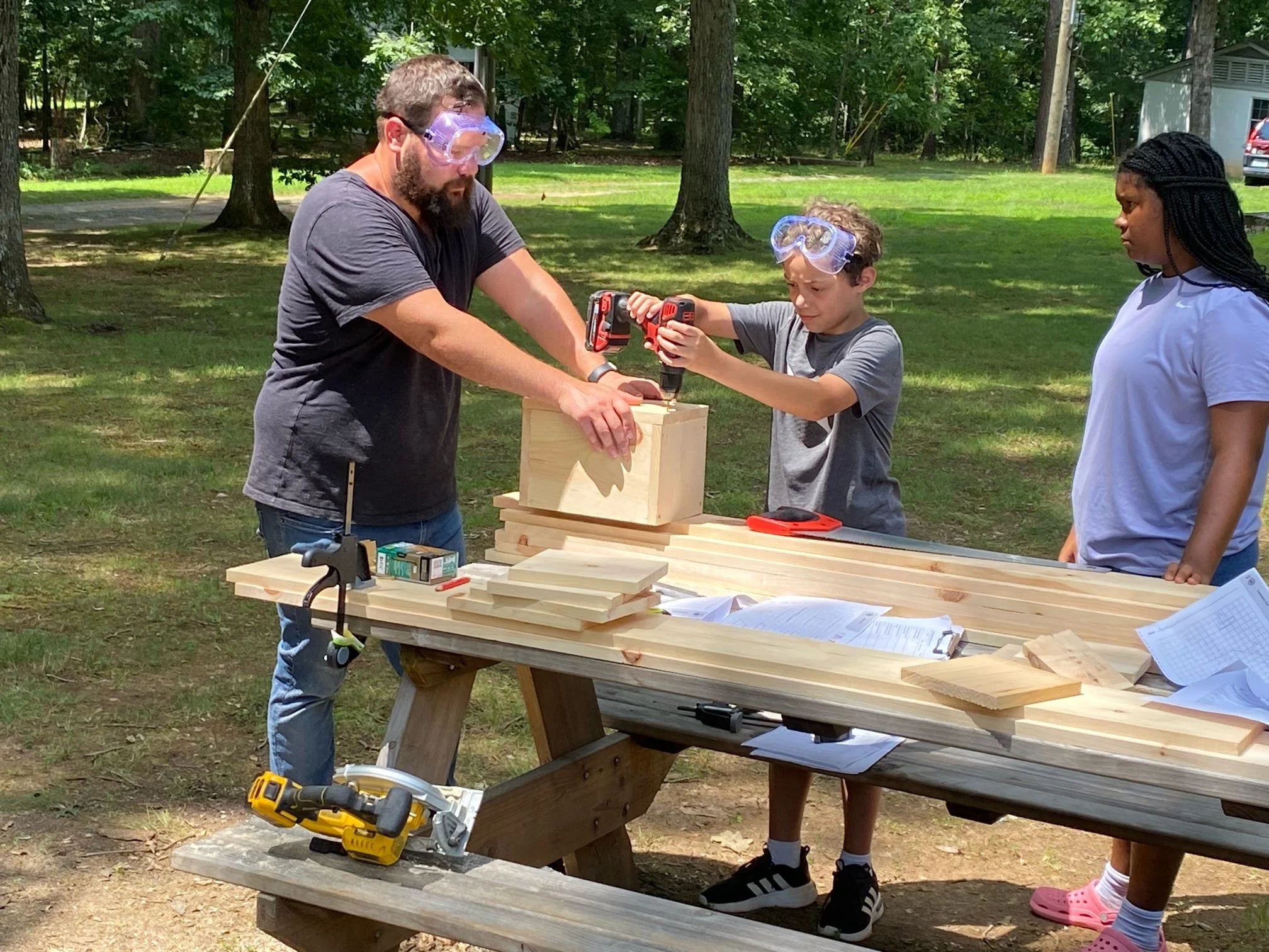Oakland Student building bird house