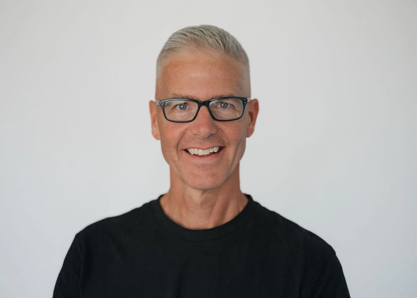 A smiling headshot of Preston, owner of Get TPA Fit, who is a client of TrueBooks.