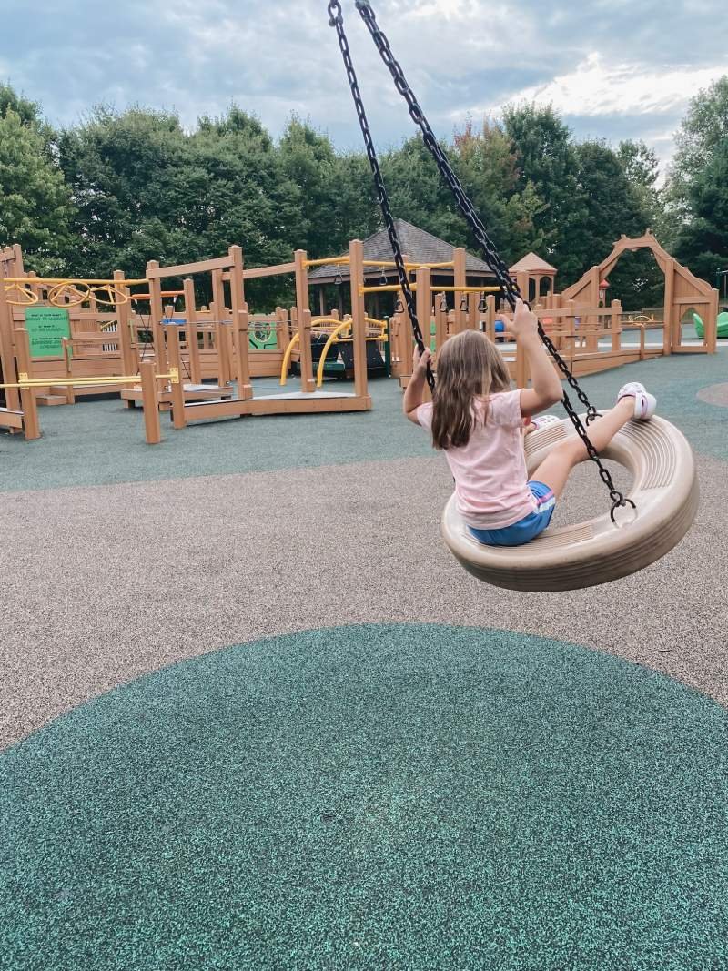 getz-playground-bel-air-md-girl-on-tire-swing.jpeg