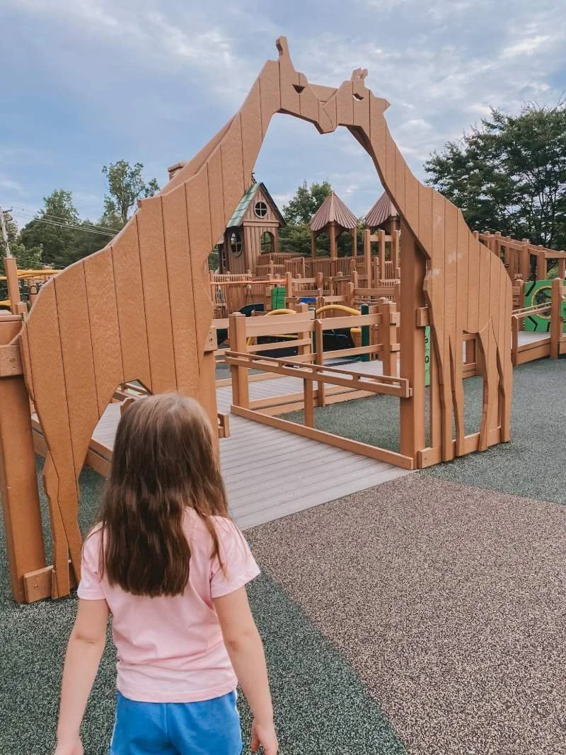 getz-playground-bel-air-md-girl-walking-toward-giraffe-entrance.jpeg