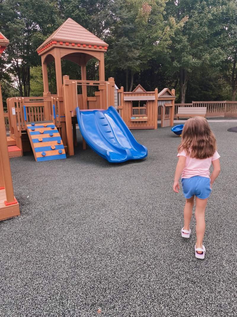 getz-playground-bel-air-md-girl-walking-toward-toddler-slides.jpeg