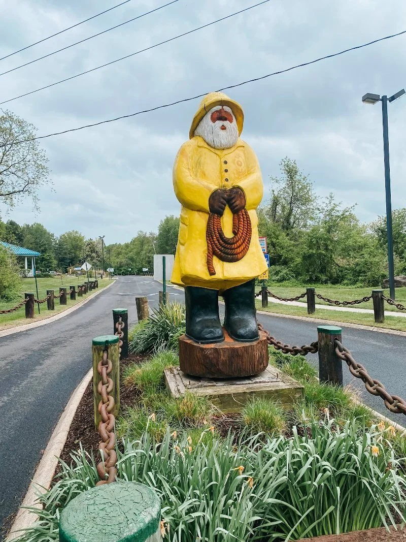 fisherman statue at mariner point park in harford county maryland