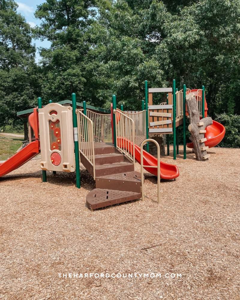 Smaller brown, red, tan, and green playground structure at Robert Copenhaver Park in Joppatown, MD is perfect for younger ages