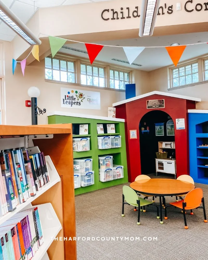 Whiteford Library's Children's Corner is a colorful area with a play house, games, and small tables