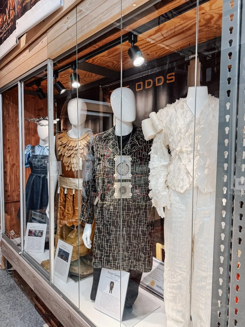costumes on display at washington street books entertainment museum