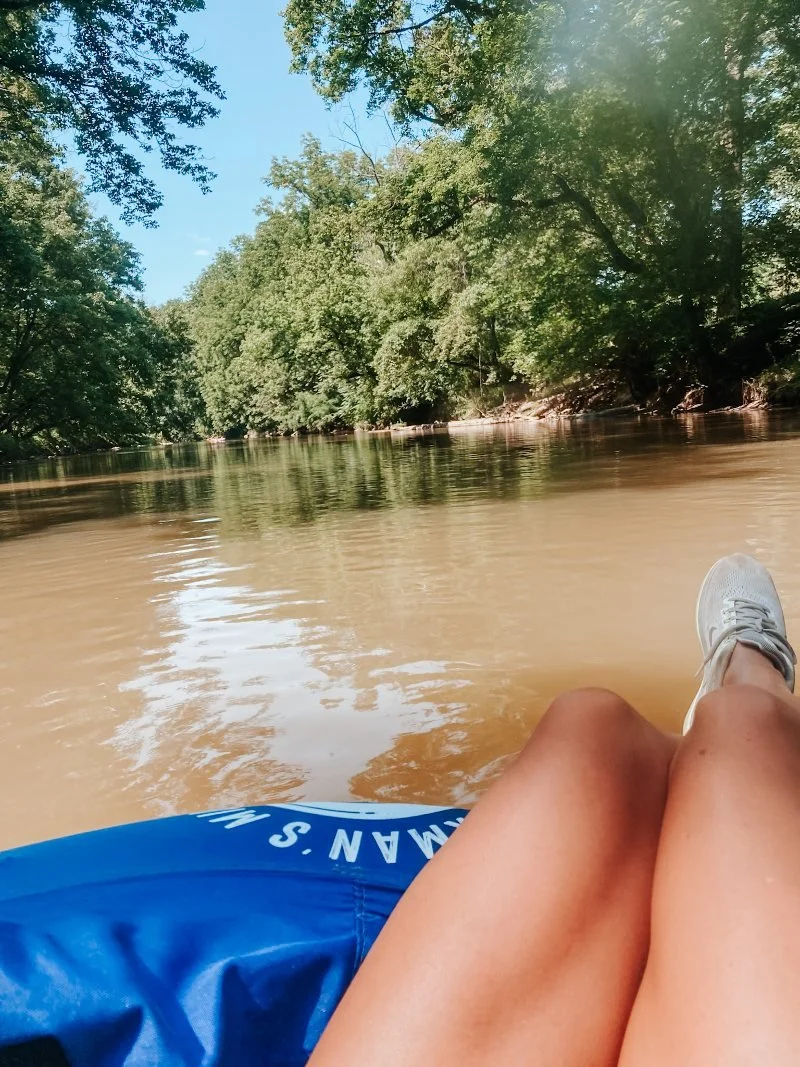 woman in an intertube floating down pequea creek in pennsylvania