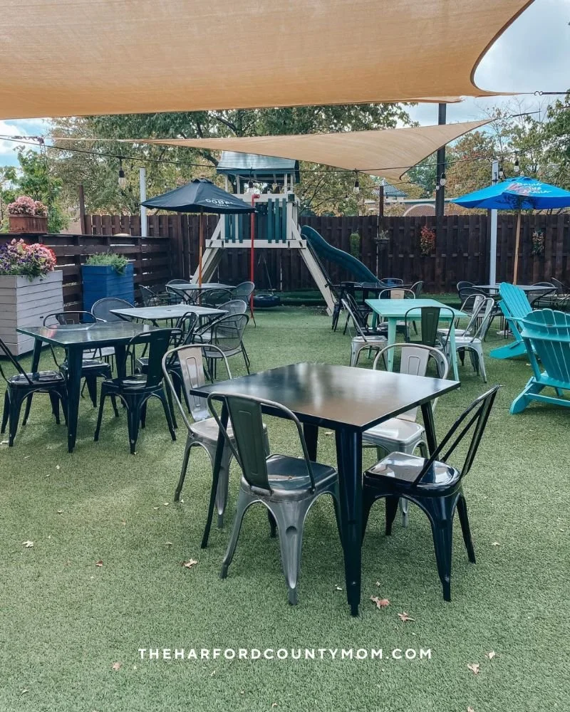 Outdoor tables with partial coverings and playground in background makes Sol Oaxaca in Bel Air, Maryland a great place to enjoy authentic Mexican cuisine with kids