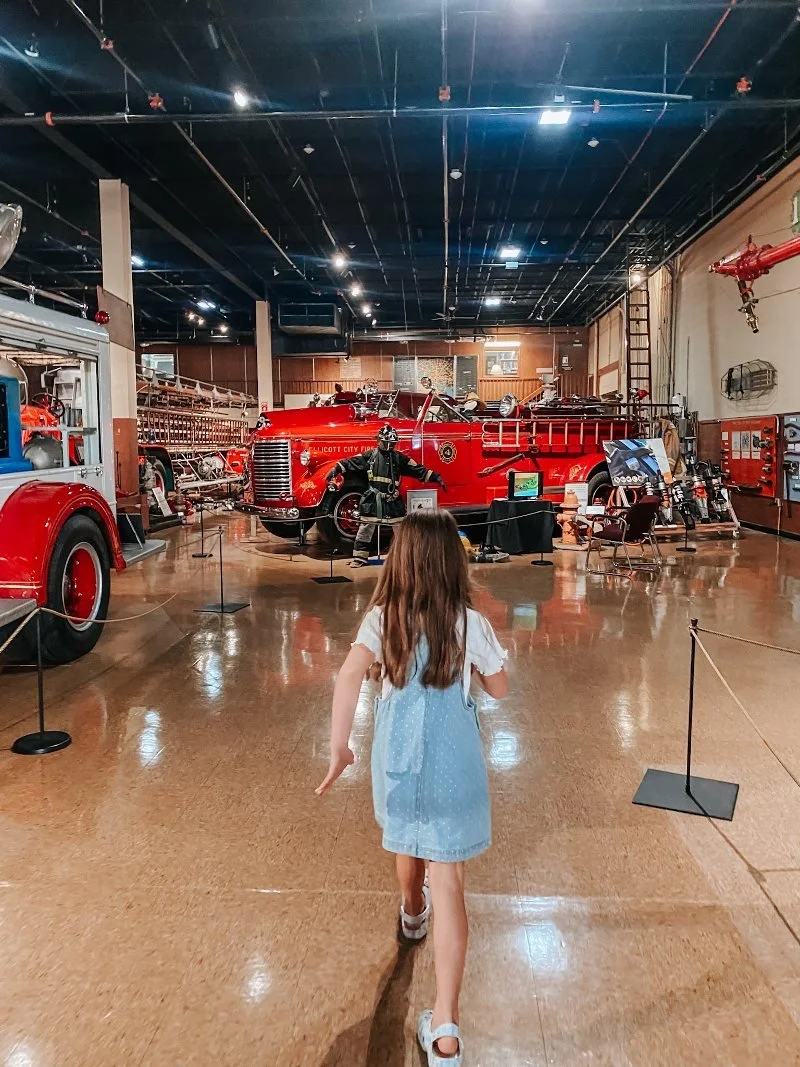 girl running through the maryland fire museum in baltimore county maryland