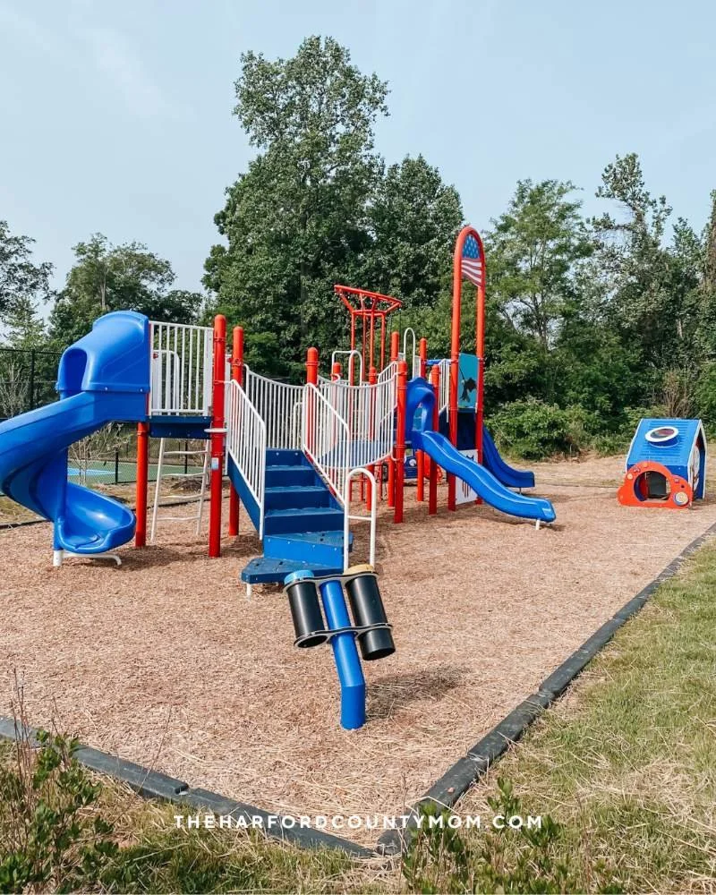 Red, white, and blue large climbing play structure perfect for littles at Rock Glen Park in Havre de Grace, MD