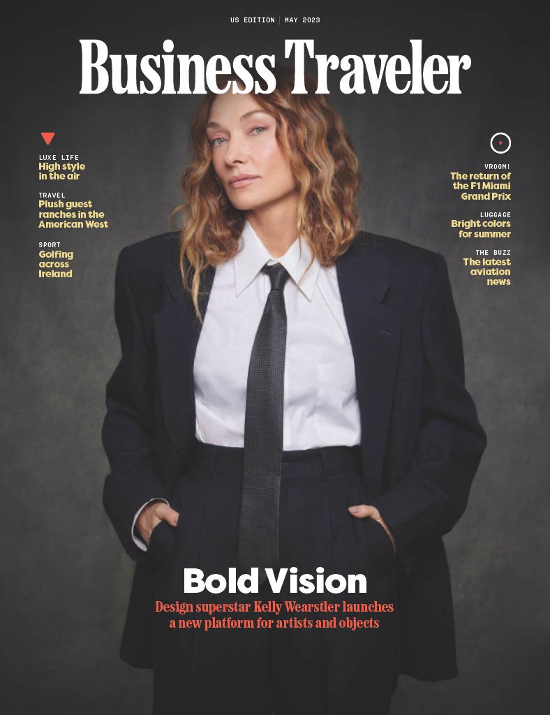 Cover of Business Traveler magazine, May 2023 issue, featuring Kelly Wearstler in a suit with her hands in her pockets, with headlines about travel, golf, aviation, and lifestyle topics.