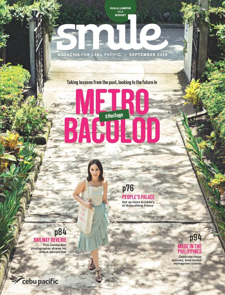 Cover of Smile magazine, Cebu Pacific, September 2019, featuring a woman walking on a stone pathway surrounded by greenery, with headlines about heritage, history, and Philippine brands.