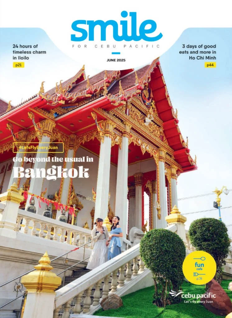Cover of a magazine titled "Smile for Cebu Pacific" June 2025 issue featuring a Thai temple in Bangkok, two women in traditional Thai dresses on steps, and a yellow circle with "fun cafe" logo.