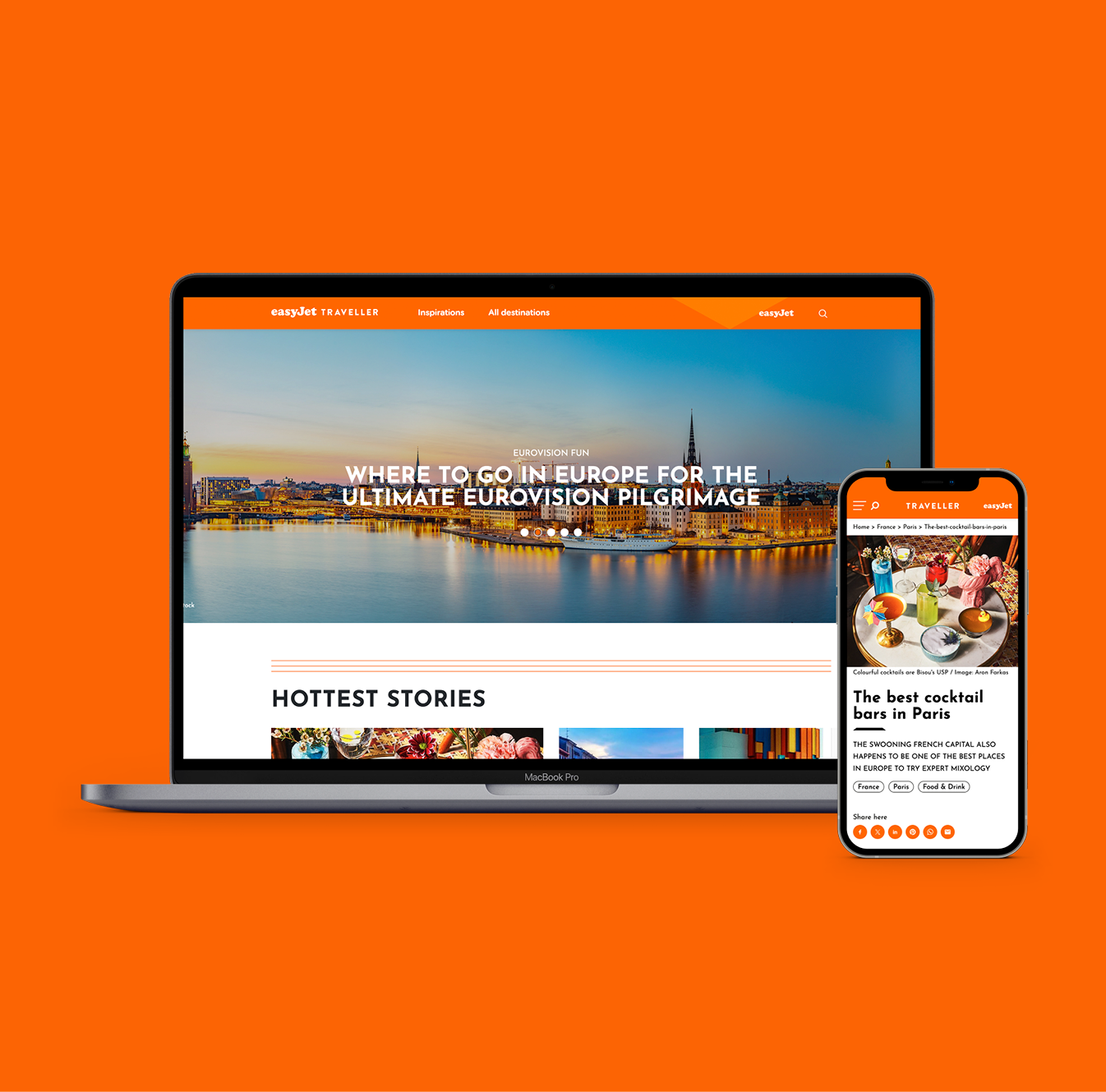 Laptop and smartphone showing travel website designs with travel articles and colorful cocktails on an orange background.