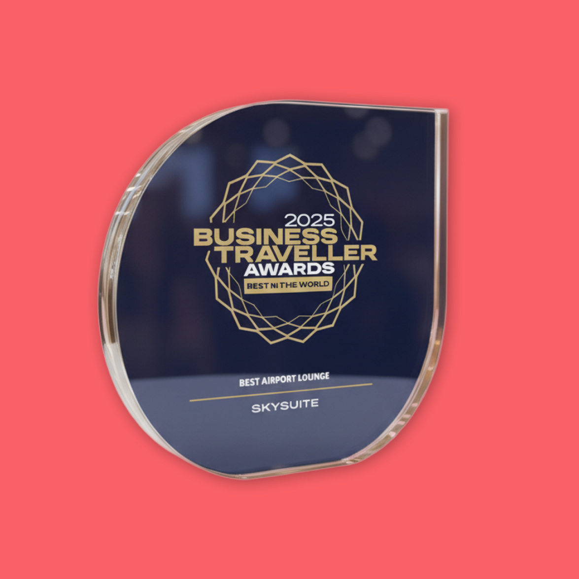 Award plaque for 2025 Business Traveller Awards for Best Airport Lounge, SkySuite, on a pink background.