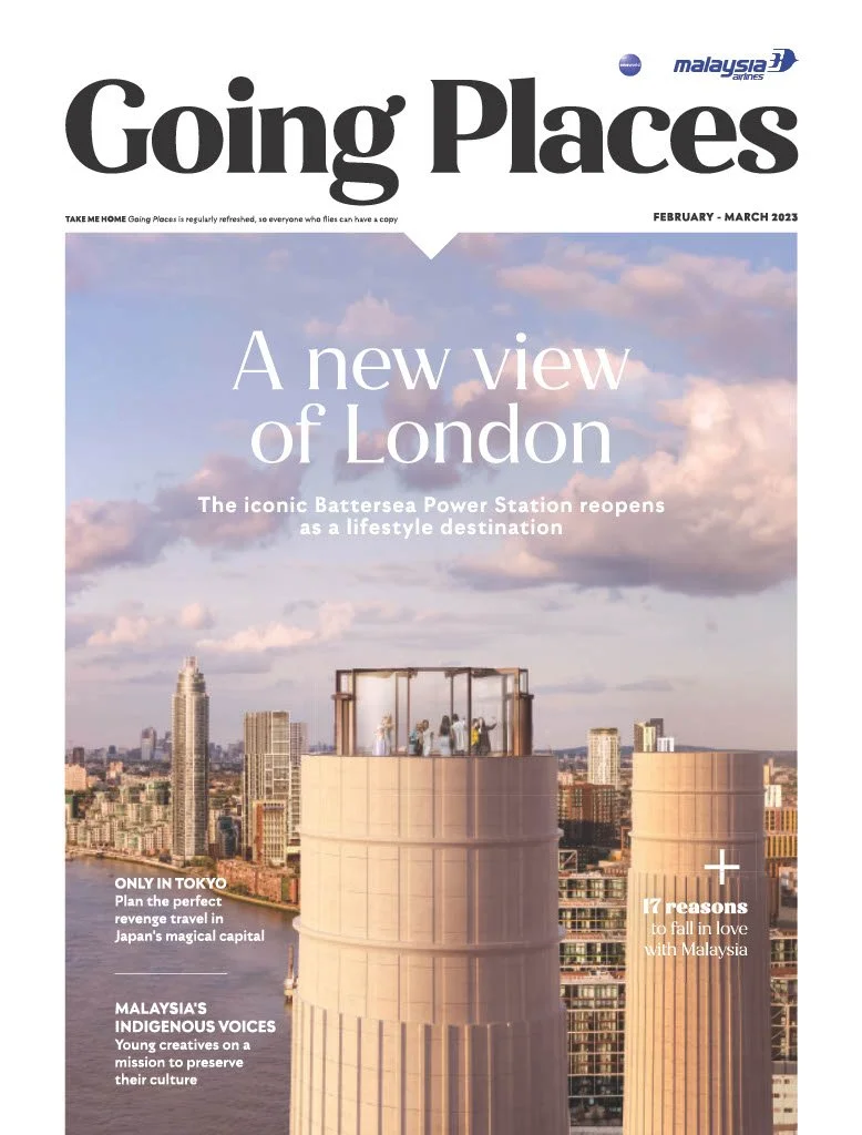 Cover of a travel magazine titled 'Going Places' featuring a cityscape of London with Battersea Power Station and a rooftop terrace with people, cloudy sky, and skyscrapers, promoting travel and cultural stories.