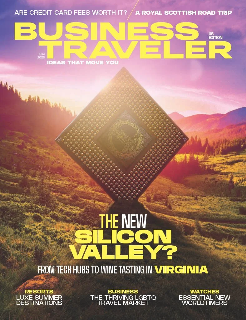 Cover of Business Traveller magazine, June 2025 issue, featuring a scenic landscape of mountains and greenery at sunset, with a large computer chip with an interconnected globe symbol in the center.