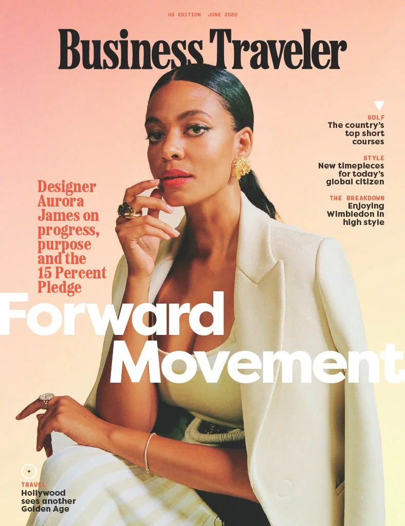 Cover of Business Traveler magazine, June 2022 issue, featuring a woman with dark hair in a sleek ponytail, wearing a light-colored blazer and jewelry, with headlines about travel, style, golf, and Wimbledon.
