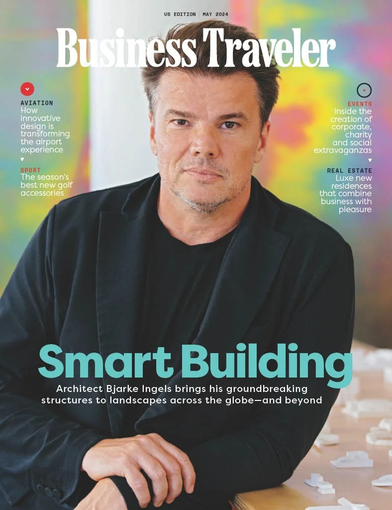 Cover of Business Traveler magazine, May 2024 issue, featuring architect Bjarke Ingels with a colorful blurred background, highlighting articles on innovation in airport design, golf accessories, corporate residence real estate, and smart building architecture.