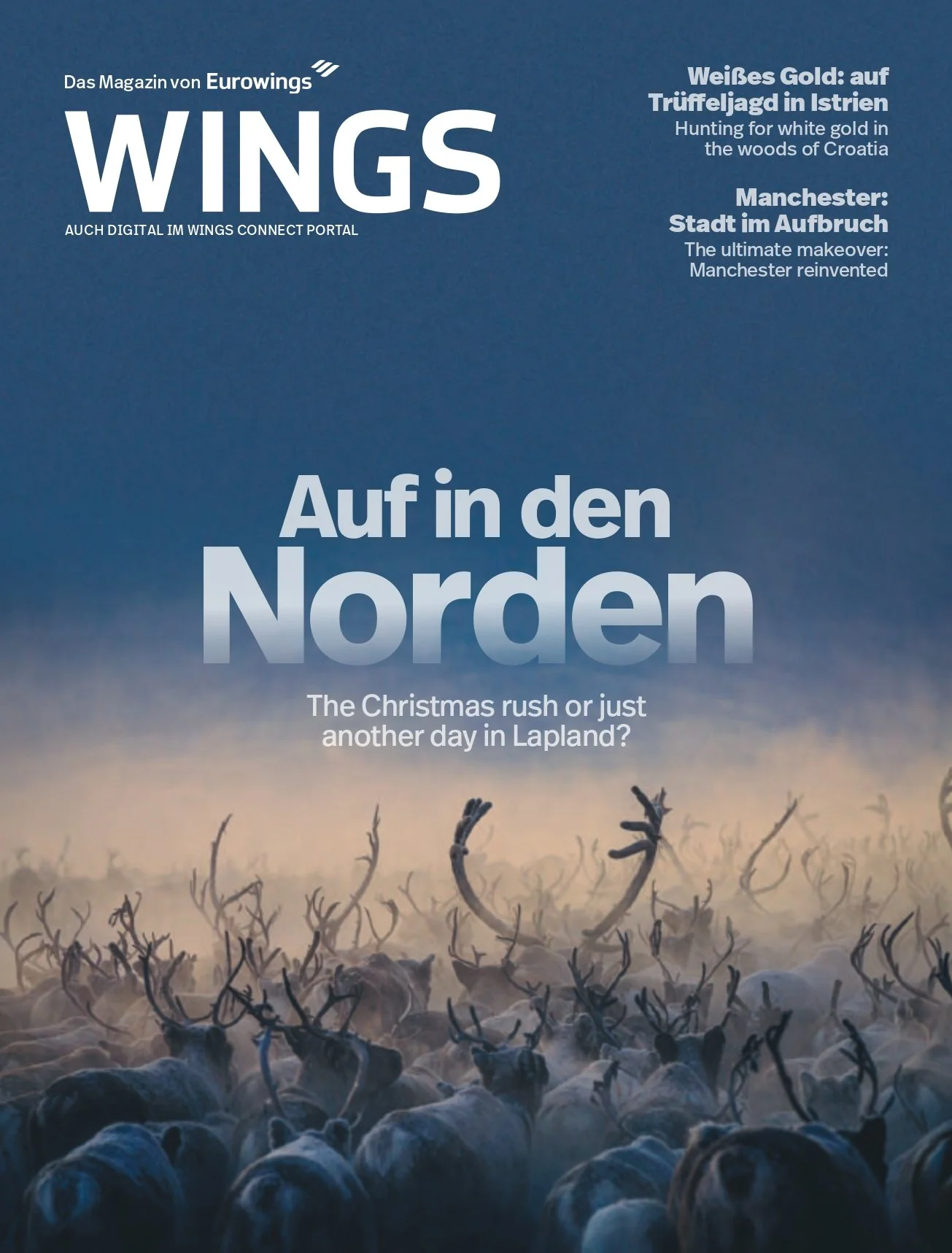 Magazine cover titled 'WINGS' with a subtitle 'Auf in den Norden' showing a misty Arctic landscape filled with reindeer with antlers, some antlers are prominent in the foreground.