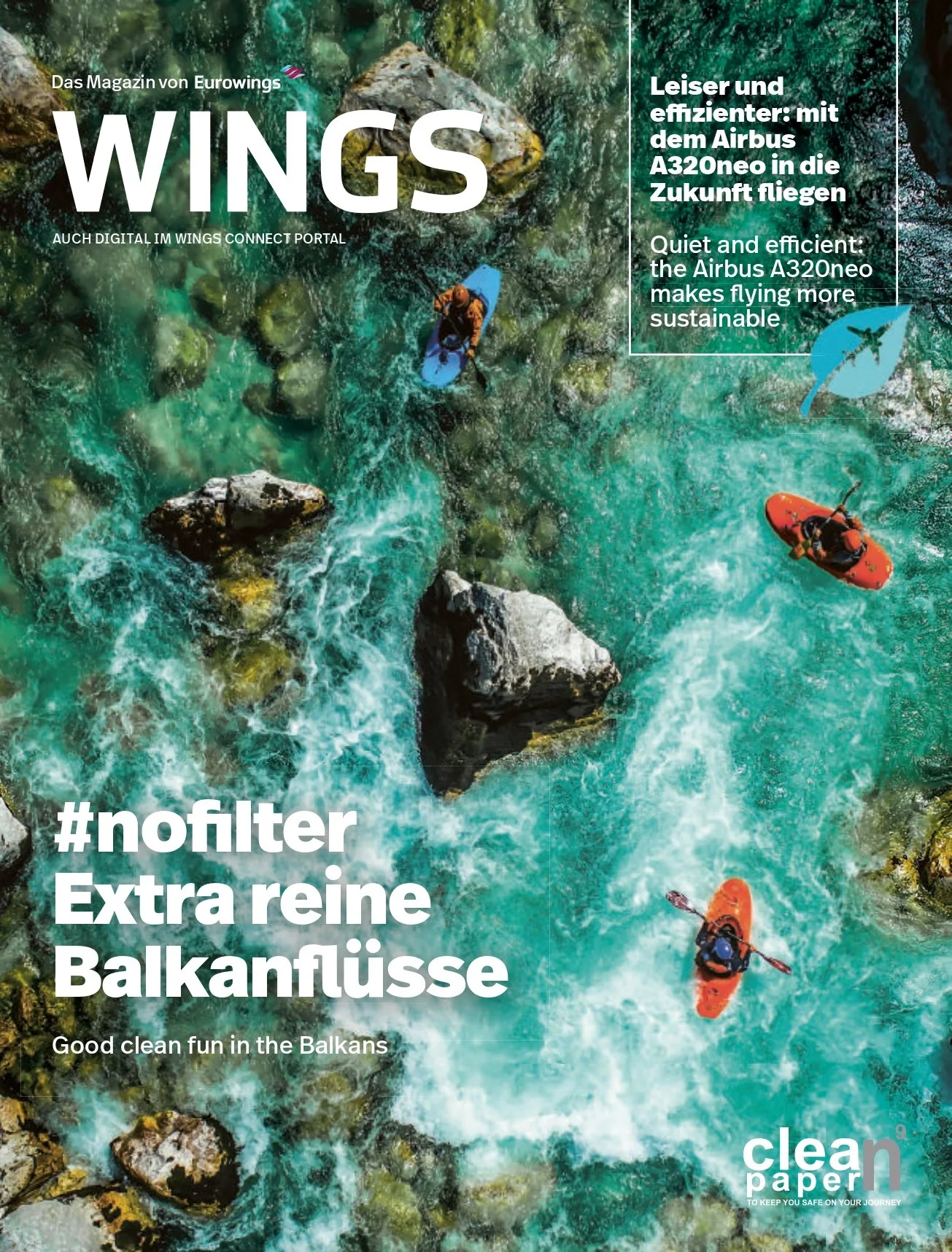 An aerial view of people kayaking in a turquoise river with rocks in the Balkan Mountains.
