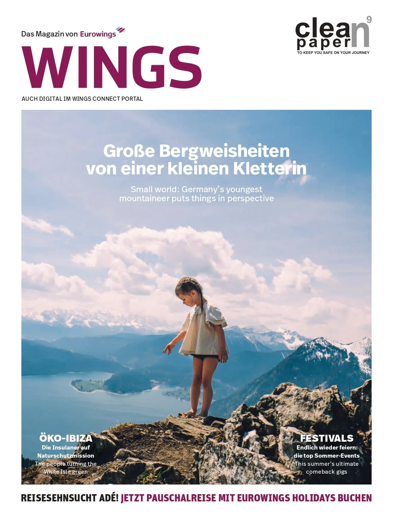Cover of a magazine titled 'WINGS' featuring a young girl standing on rocks atop a mountain range with a lake below, under a partly cloudy sky, emphasizing an outdoor mountain adventure.