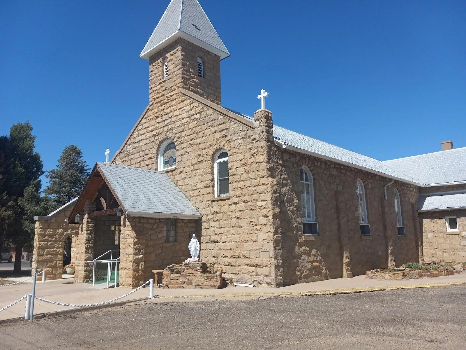 St. Anthony of Padua Catholic Church. Stone church with gray roof.