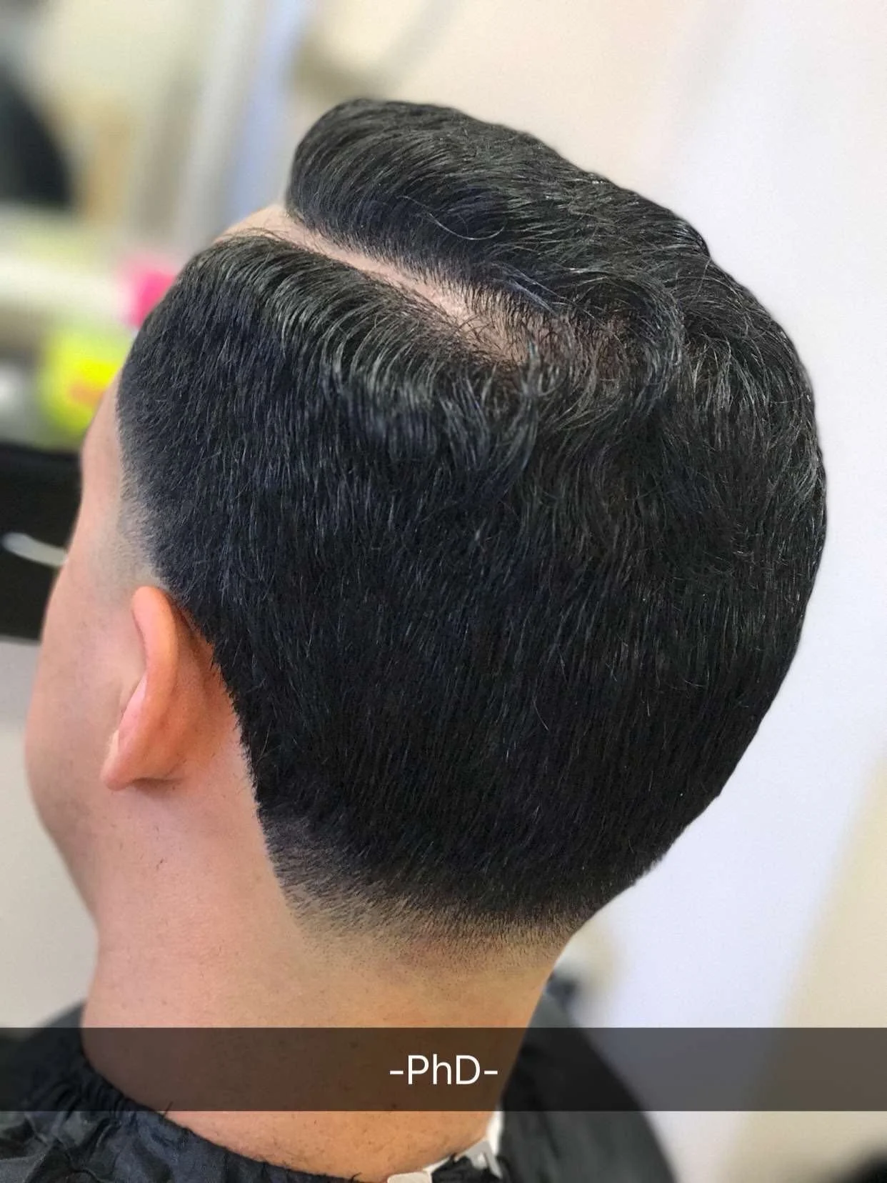Rear profile of guests men’s cut in Albuquerque nm.