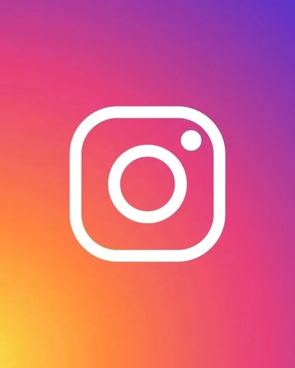Instagram logo on a colorful gradient background.