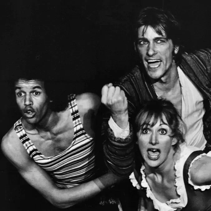 Black and white photo of Ian Magilton, Linda Wise, and Jonathan Hart-Makwaia performing Pagliacci in Malérargues in 1982.