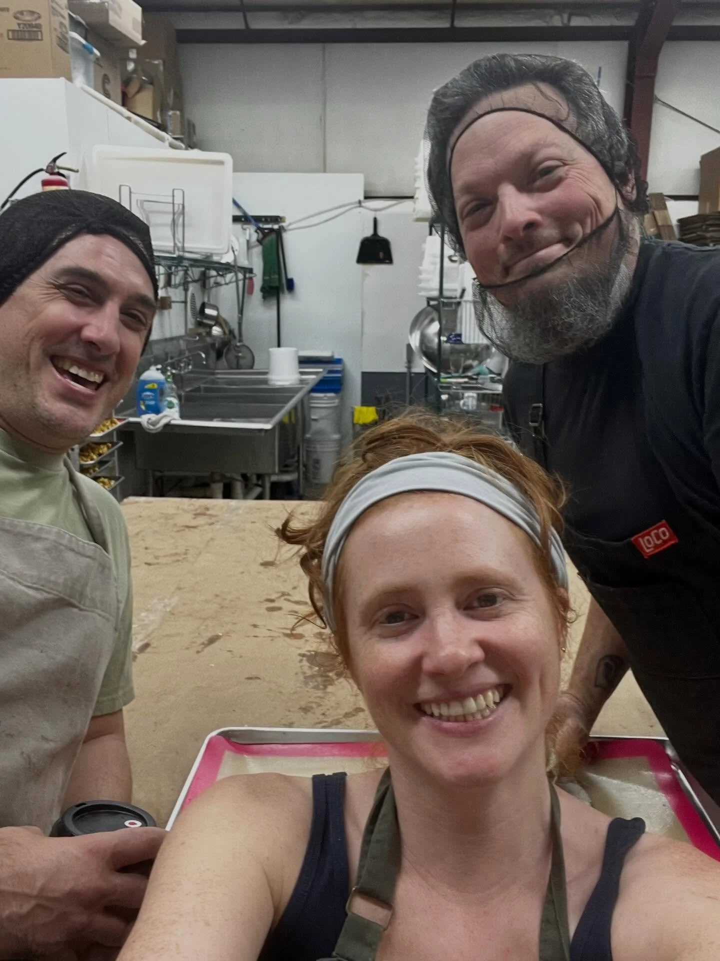 3 tired parents workin the kitch on a snowy Sunday 😊🍿✨