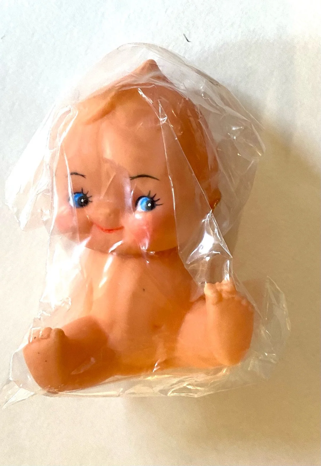 vintage-kewpie-w-butterfly-toe-v.jpg