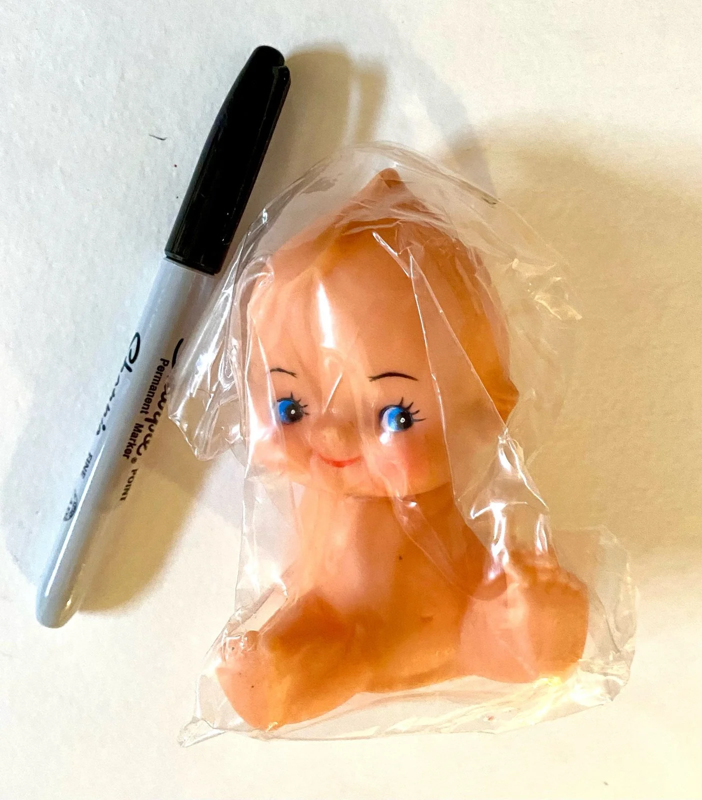 vintage-kewpie-w-butterfly-toe-v.jpg