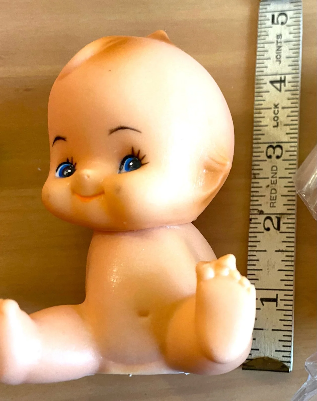 vintage-kewpie-w-butterfly-toe-v.jpg