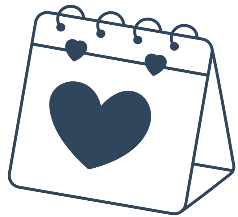 A desk calendar with a large heart design on the page, decorated with smaller heart cutouts along the top edge.