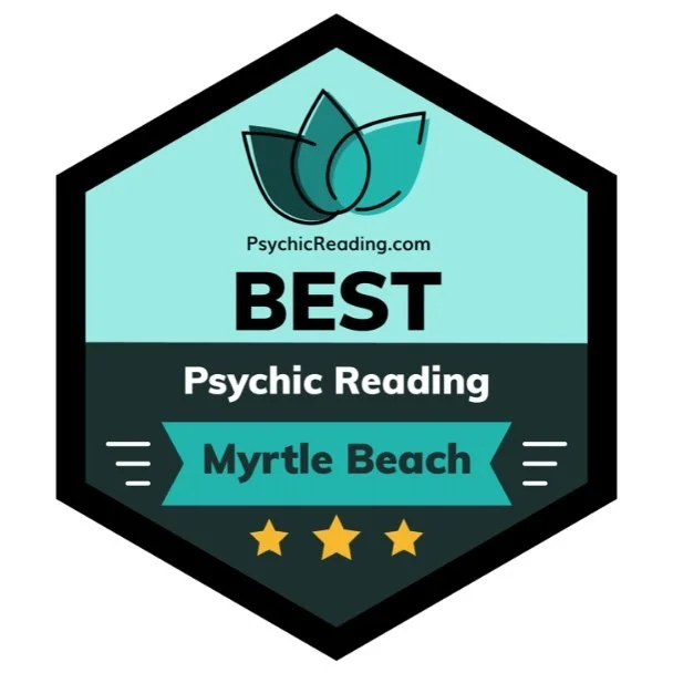 Badge with a lotus flower icon at the top, the text 'PsychicReading.com' below it, followed by bold 'BEST' and 'Psychic Reading' underneath, and a cyan ribbon with 'Myrtle Beach' in black, three gold stars at the bottom.