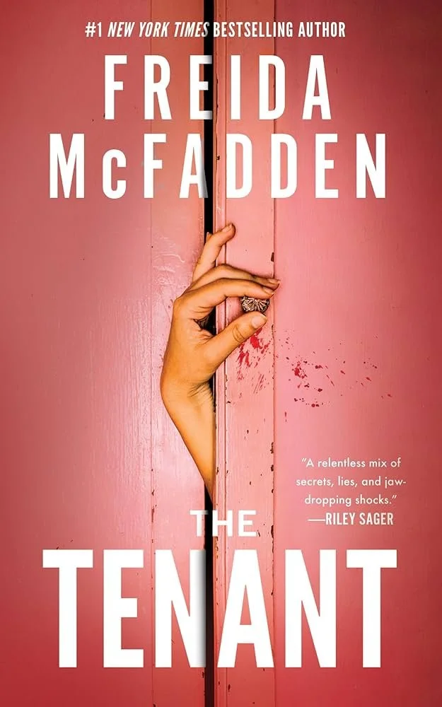 Book cover for 'The Tenant' by Freida McFadden, featuring a pink door with a hand peeking through a small opening, holding the door partially open. The title and author's name are displayed prominently.