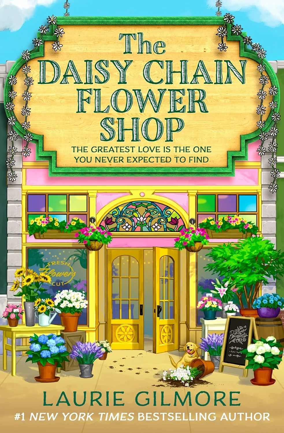 Colorful flower shop storefront with green awning, pink, purple, blue, yellow, and white flowers in pots, hanging baskets, and window boxes. Sign reads "The Daisy Chain Flower Shop" and a quote below it. A dog is sitting near a chalkboard sign outsid