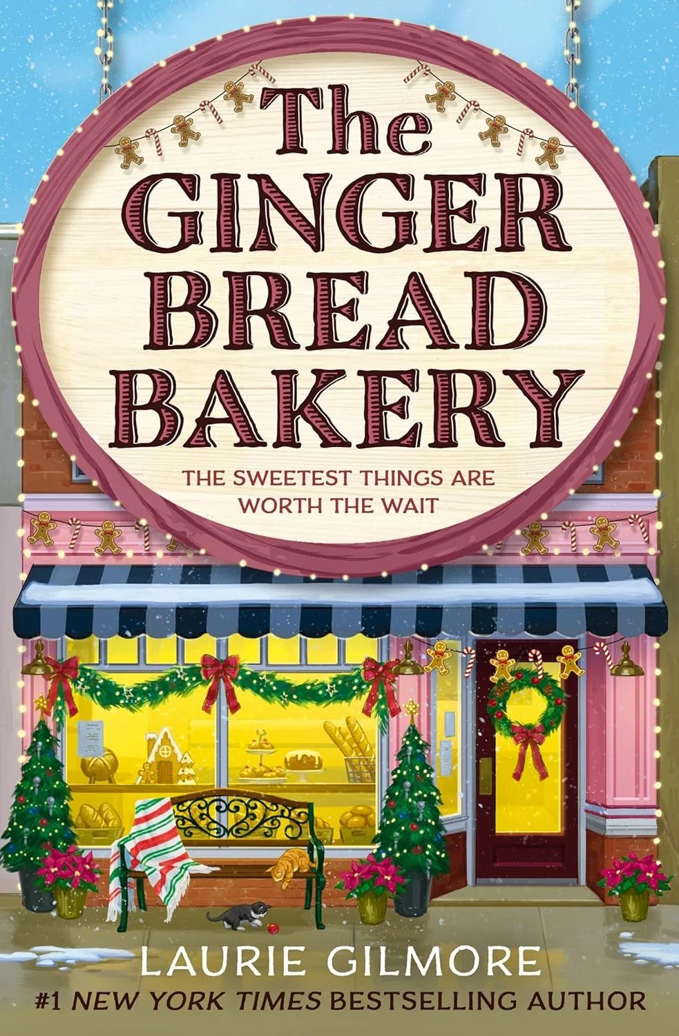 A cozy bakery storefront decorated for Christmas with green garlands, red ribbons, wreaths, and gumdrop and gingerbread men. Snow on the ground and a sign reading 'The Gingerbread Bakery: The sweetest things are worth the wait.' A bench with a red, g