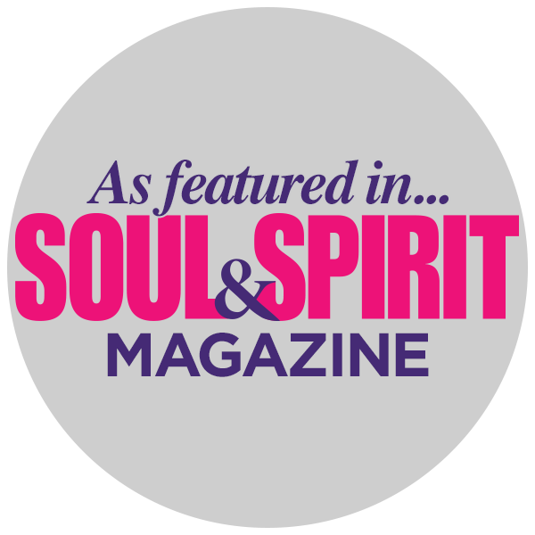 Logo for Soul & Spirit Magazine featuring purple and pink text on a grey background.