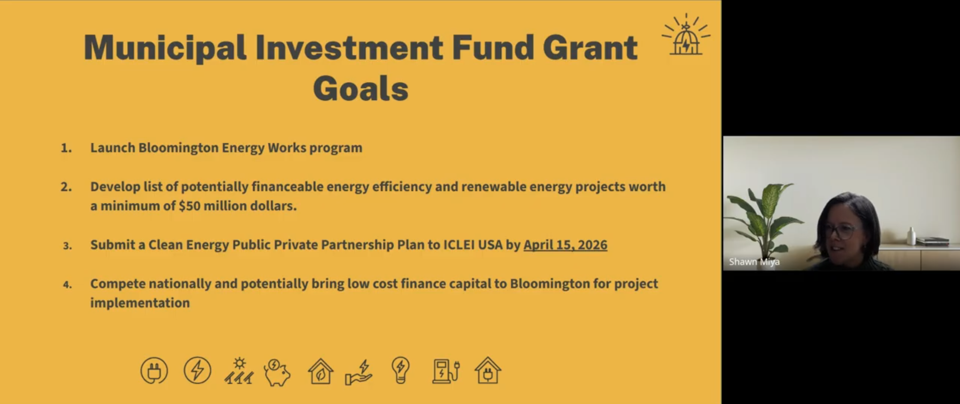 Screenshot of a webinar showing the speaker and slideshow