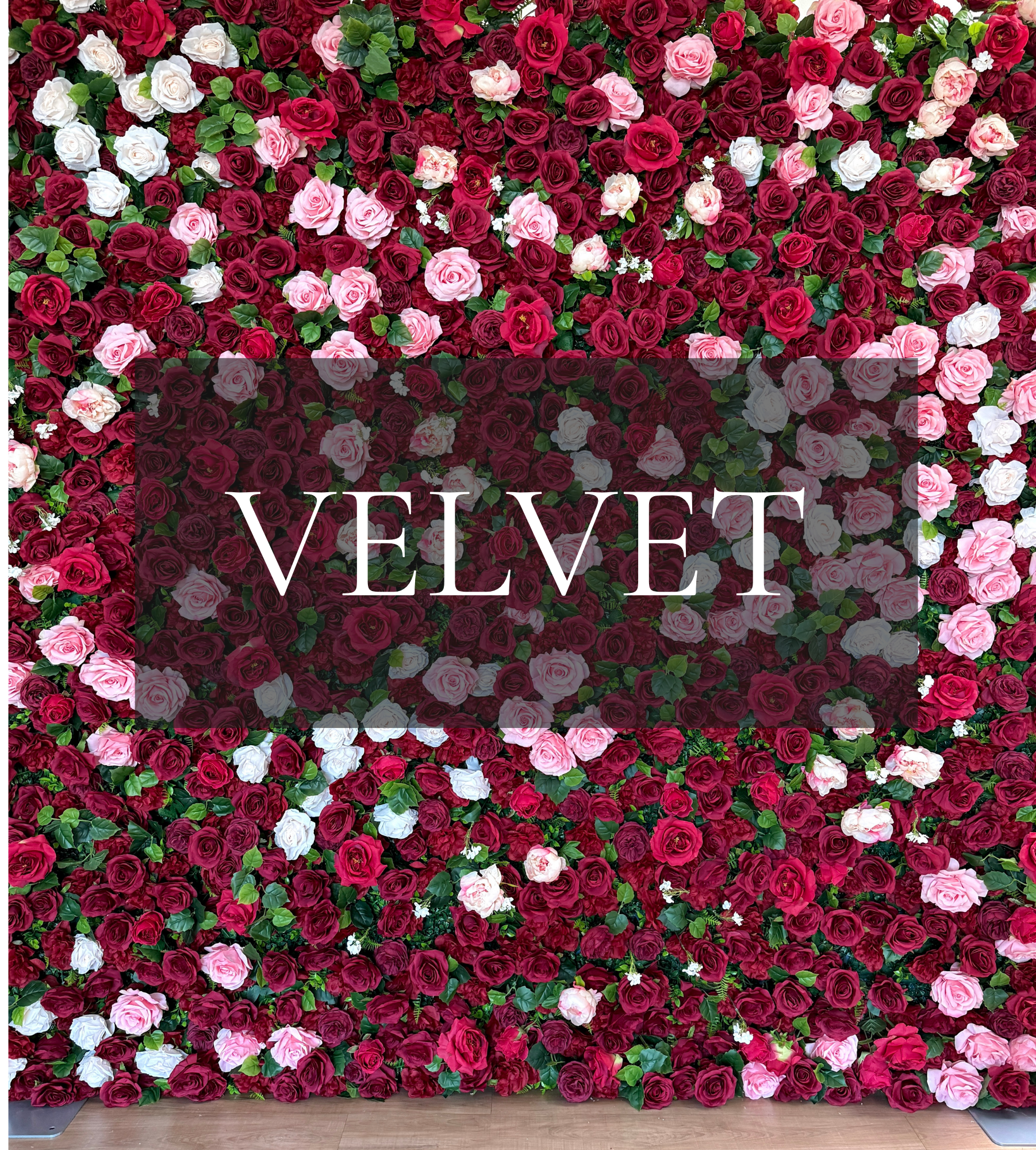 Deep burgundy roses, soft pink and blush blooms, wild greenery.