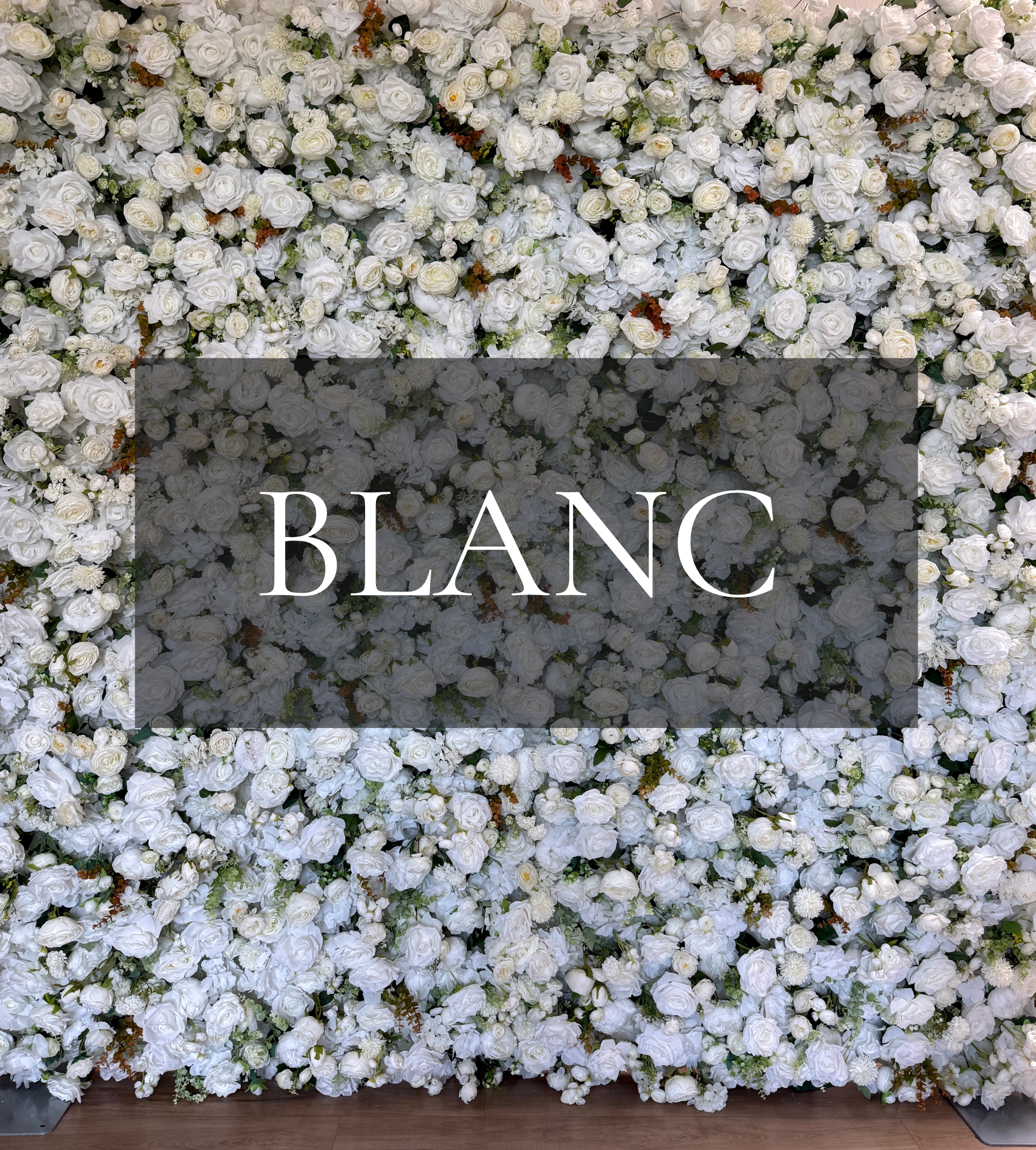 White and ivory roses, delicate white filler blooms, soft green fern.