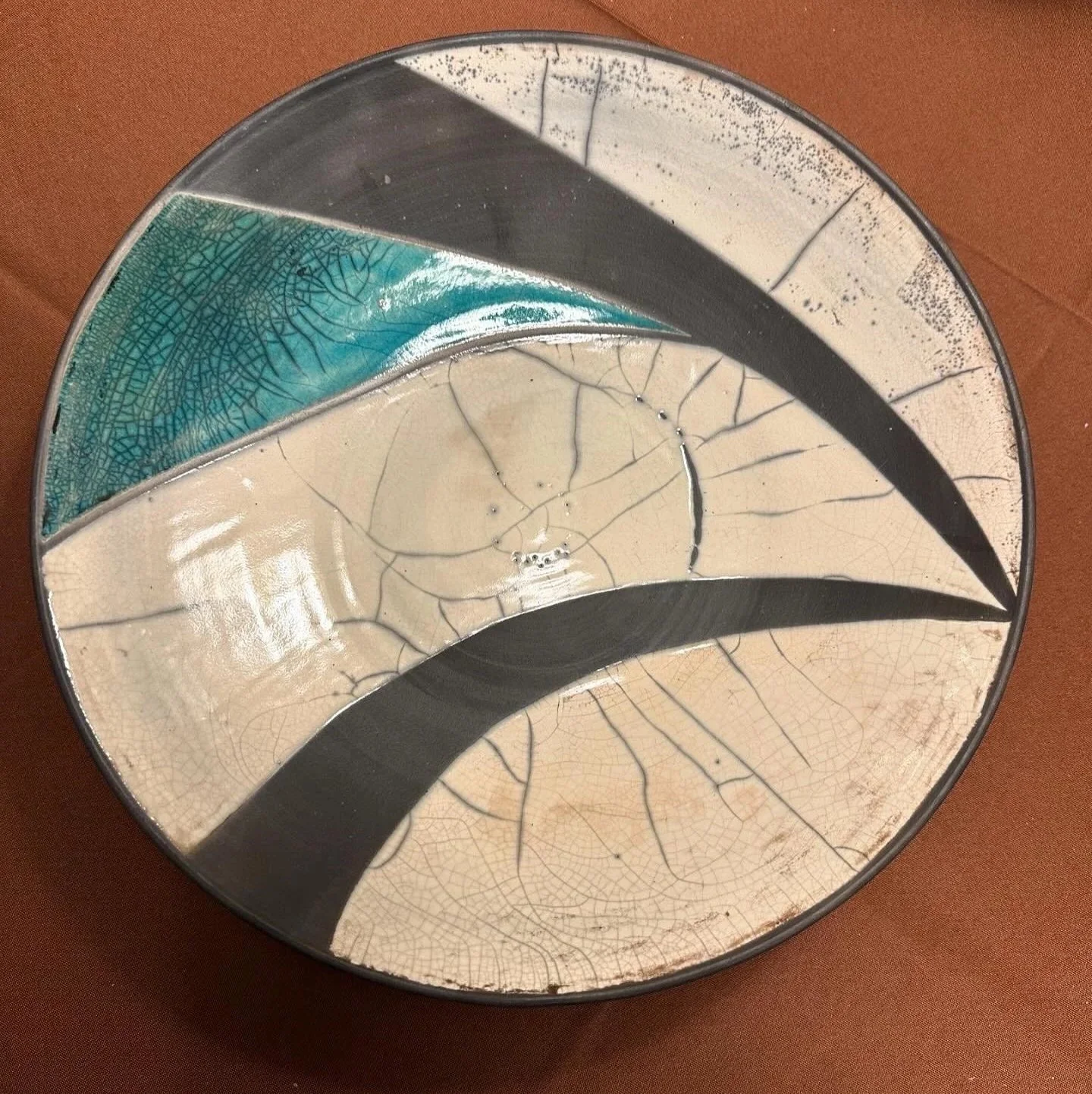 My favorite piece of Raku.  Stunning.  Also not vitrified, but an awesome statement piece.