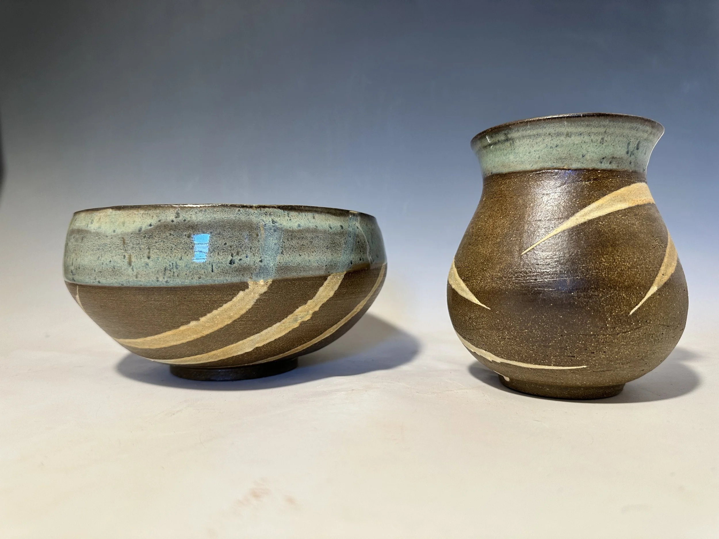 Sweet set that explores some dynamic swooshes.  Need to do more of these.  The vase is about 6 inches high.the bowl about 4".