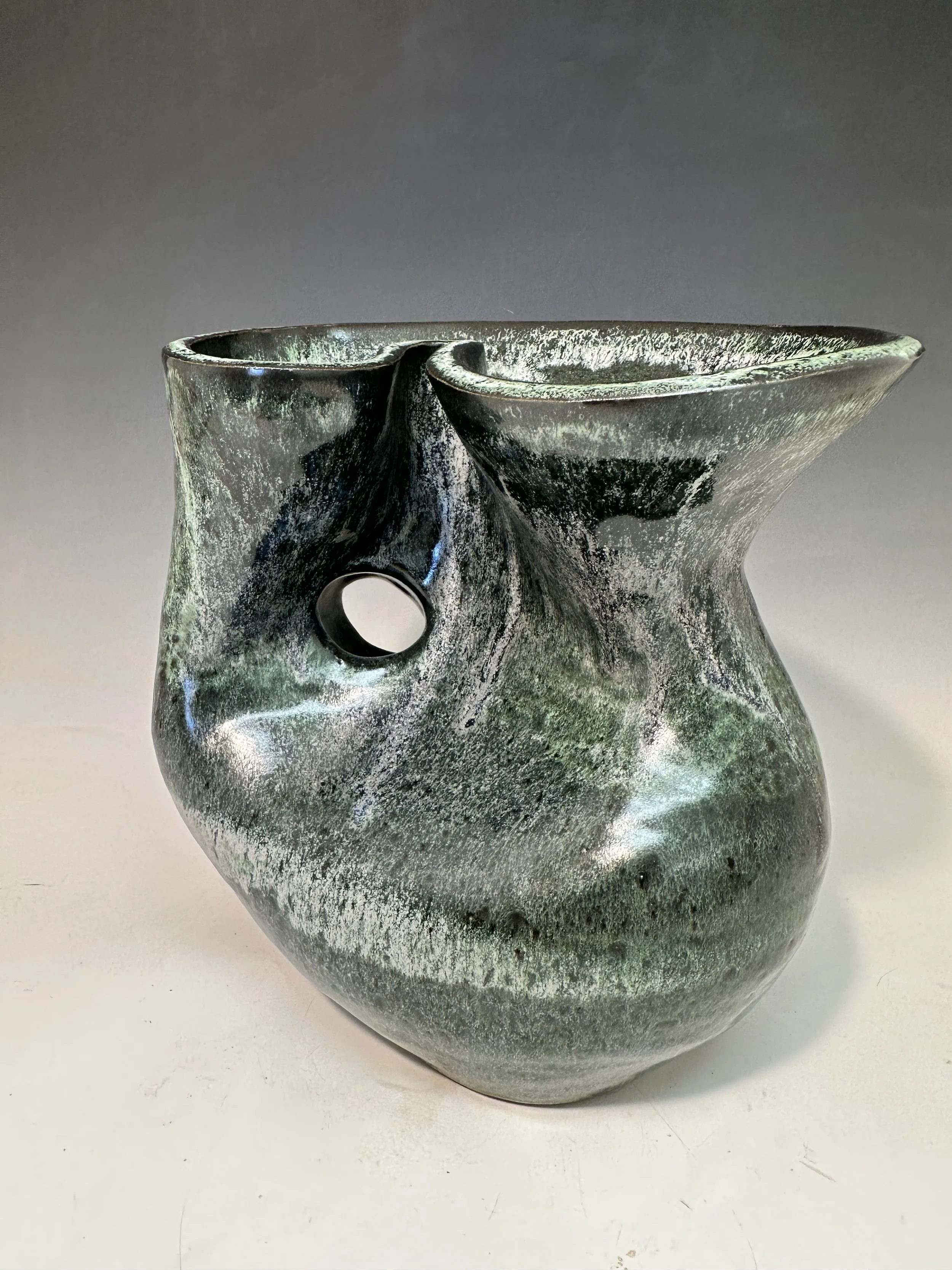 I called this Aria.  My first coil built vessel! About 13" high, 6" at deepest part.